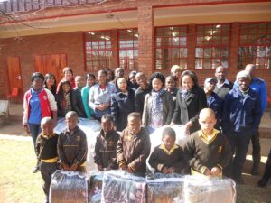 Mandela Day 2016 Nyamezela Group Metering Donating to School 01